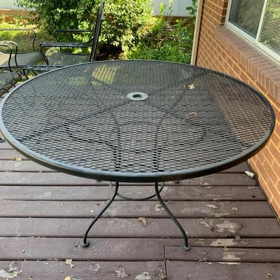 Iron Patio Table and 6 rocking chairs