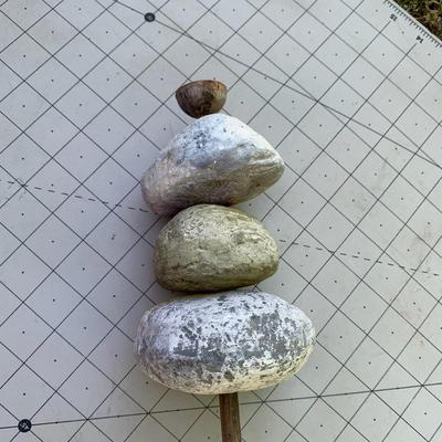 Balanced multicolored stone