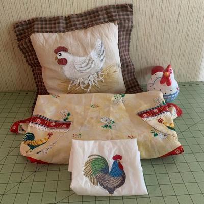 Rooster apron, dish cloth, pillow and rooster statue