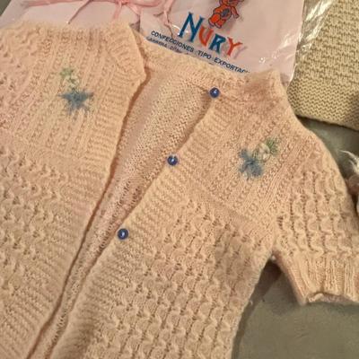 Vintage knitted infant clothing