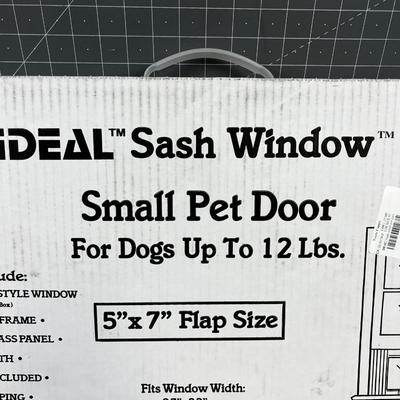 557 IDEAL Window Pet Door NEW IN THE BOX 
