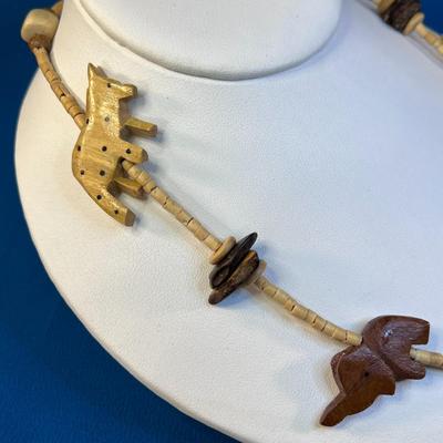 WOOD BEAD NECKLACE WITH CARVED WOOD AFRICAN ANIMALS