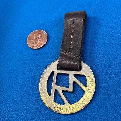 VINTAGE SOLID BRASS MARLBORO BELT FOB ON LEATHER STRAP