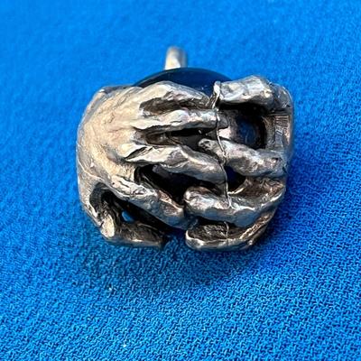 COOL HANDS GRABBING METALLIC BALL PENDANT SCULPTED LOOK