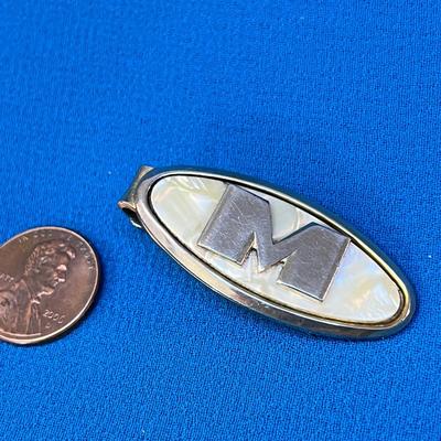 60â€™s ERA MONOGRAMMED â€œMâ€ TIE CLIP PEARLY BACKGROUND