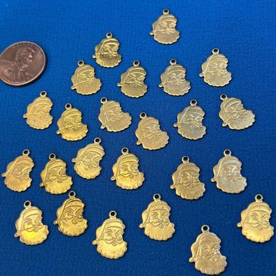 SET OF 24 SMALL INCISED SANTA CHARMS