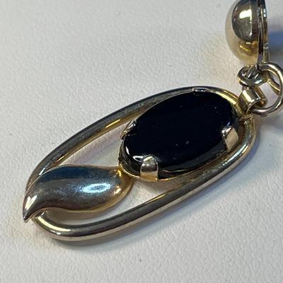 VINTAGE DANGLY BLACK, GOLD STYLIZED LEAF EARRINGS