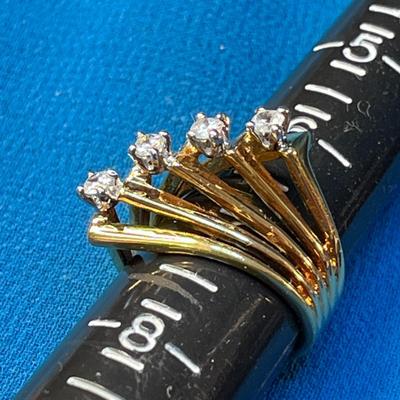 STRIKING MULTI-BAND 18K H.G.E. RING WITH 4 C.Z.â€™s?