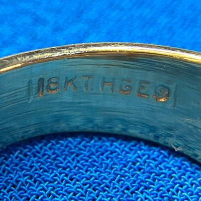 STRIKING MULTI-BAND 18K H.G.E. RING WITH 4 C.Z.â€™s?