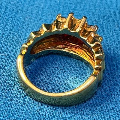 NICER GOLD TONE RING w/PRONG SET RHINESTONES, RED CENTER STONE