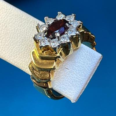 NICER GOLD TONE RING w/PRONG SET RHINESTONES, RED CENTER STONE