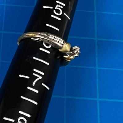 10 Karat Ring, with small Diamonds w 6 tiny Diamonds and a gold heart on each side. 