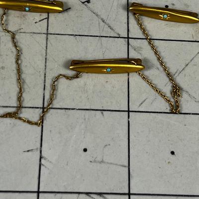 ?   Not sure -  3 Bars plus 2 connecting Chains with TINY Turquoise