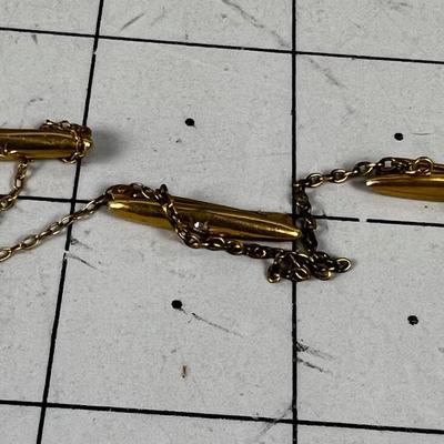 ? Not sure 3 Bars plus 2 connecting Chains with TINY Diamond