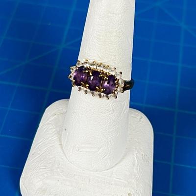14 K KGP RING , (3) Amethyst surrounded 