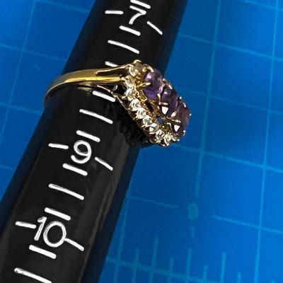 14 K KGP RING , (3) Amethyst surrounded 
