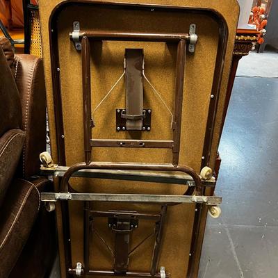  4 Foot Folding Table with Wheels attached