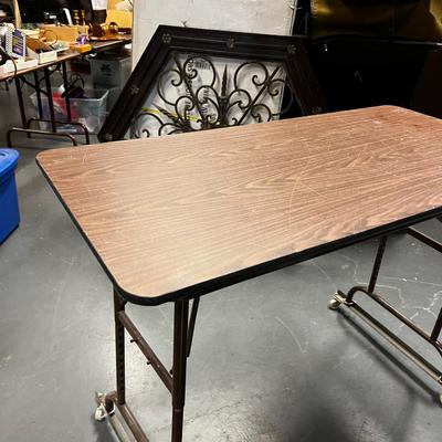  4 Foot Folding Table with Wheels attached
