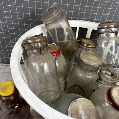 Basket full of Glass Antique Jars and Bottles 