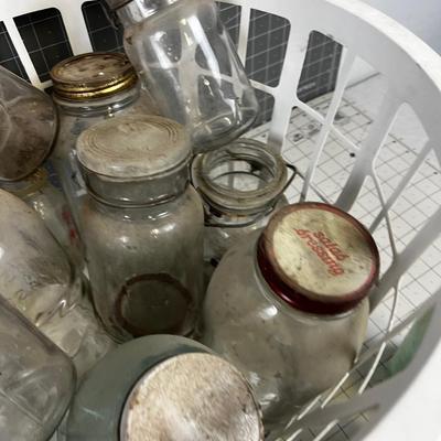 Basket full of Glass Antique Jars and Bottles 