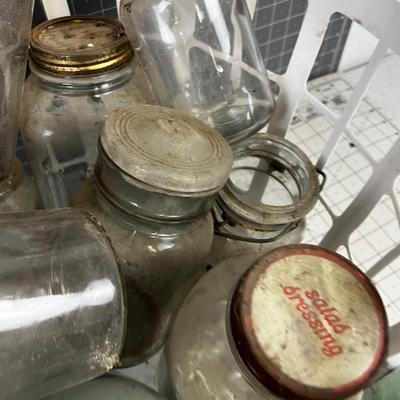 Basket full of Glass Antique Jars and Bottles 