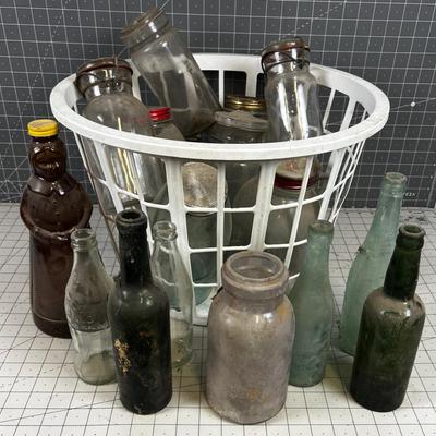Basket full of Glass Antique Jars and Bottles 