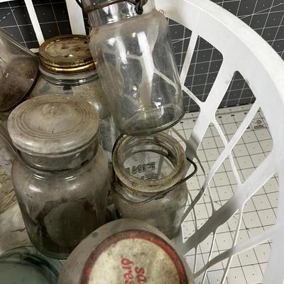 Basket full of Glass Antique Jars and Bottles 