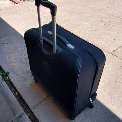 FOUR WHEELED HANDLED PORTIBLE CASE AND SUITCASE