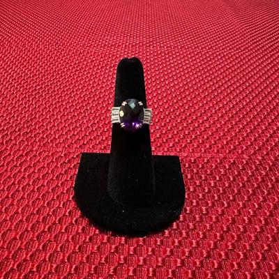 STUNNING STERLING SILVER RING WITH PURPLE STONE
