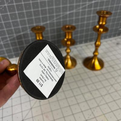 Brass Toned Candle Sticks (4) 