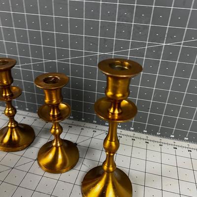 Brass Toned Candle Sticks (4) 