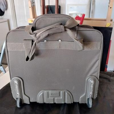 FOUR WHEELED CASE/LUGGAGE WITH HANDLE