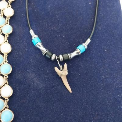 BLUE BEADED NECKLACES-SHARK TOOTH PENDENT AND TWO PAIR EARRINGS