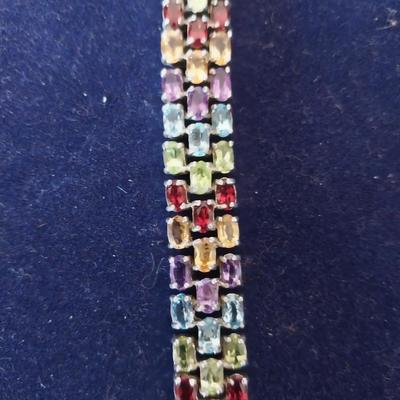 925 SILVER AND COLORED STONE BRACELET AND THREE PAIRS EARRINGS