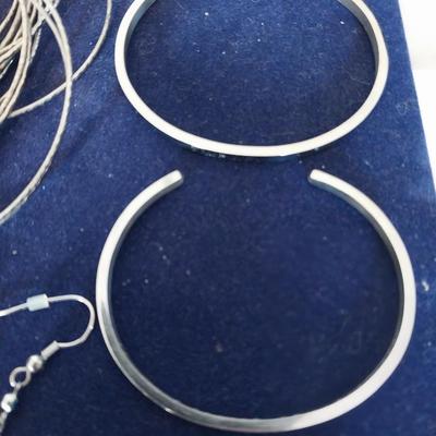 SILVER LADIES EARRINGS AND BRACELETS