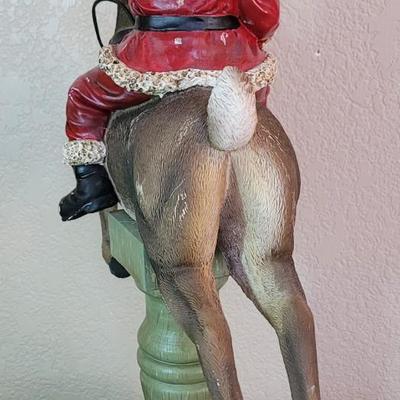 Large Santa Riding a Reindeer Statue