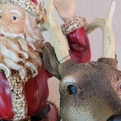 Large Santa Riding a Reindeer Statue