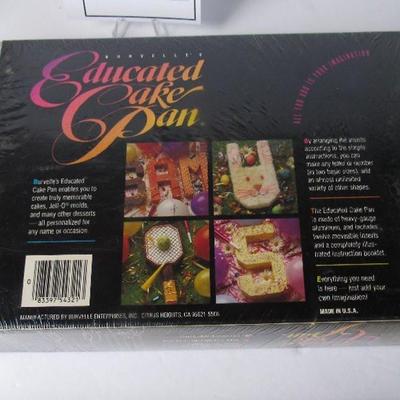 Lot 338:  Educated Cake Pan, Unused