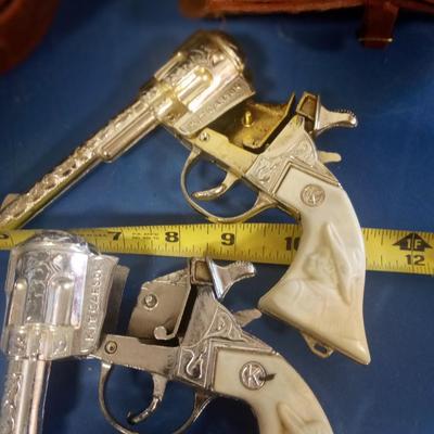 LOT 73 TWO KIT CARSON TOY CAP GUNS WITH HOLSTERS