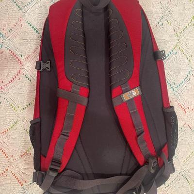 NORTH FACE: RED BACKPACK