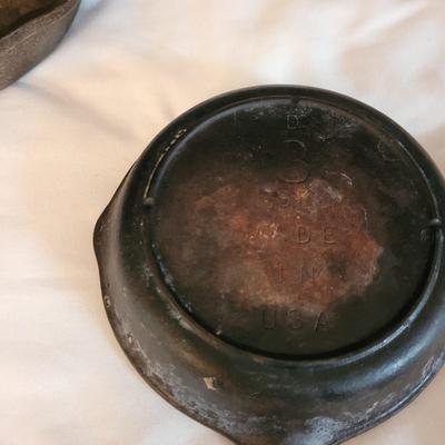 Four Cast Iron Pans (K-CE)