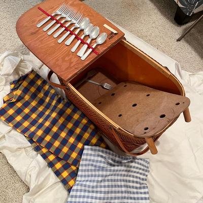 Vintage large picnic basket with some supplies