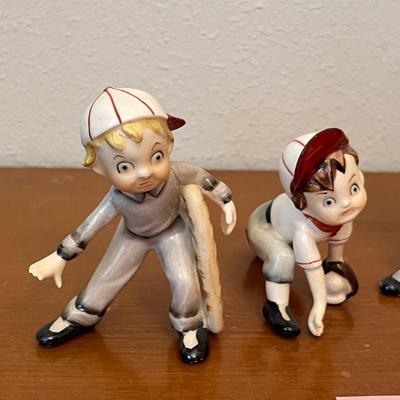 Adorable, ceramic baseball figurines