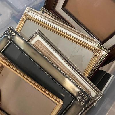 Large tub of picture frames