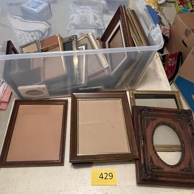 Large tub of picture frames