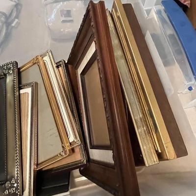 Large tub of picture frames