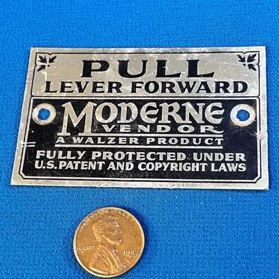 COOL ANTIQUE EMBOSSED METAL DISPENSER PLATE / TAG