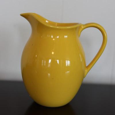 Two Pitchers and A Creamer