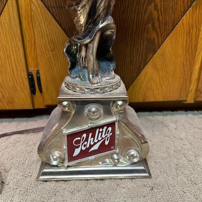 LIGHTED SCHLITZ LADY HOLDING A GLOBE BEER ADVERTISEMENT