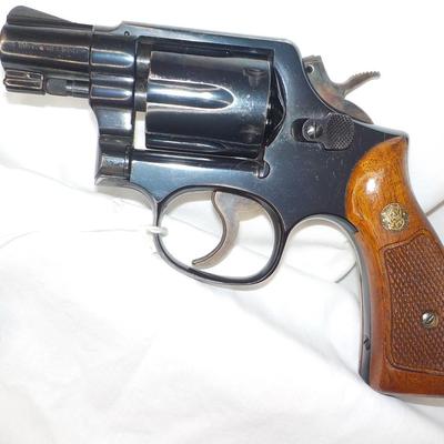 Police Chief S & W 38 special snub nose revolver. Est. $200 to $600.
